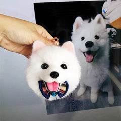 A real needle-felted mini of a pet's face on a key ring